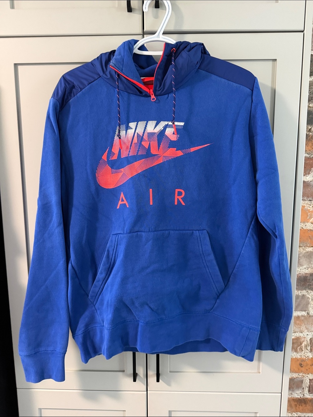 Nike Blue Pullover Hoodie with Coral Logo
